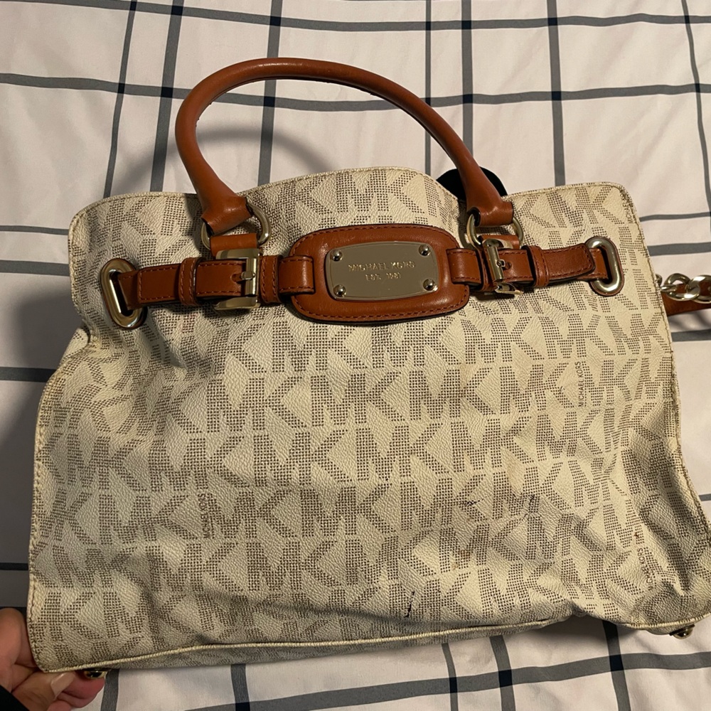 Used, good condition, a little yellow on bottom, one stain in inside